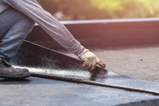 Professional Basement Waterproofing technician working in Baxter, TN